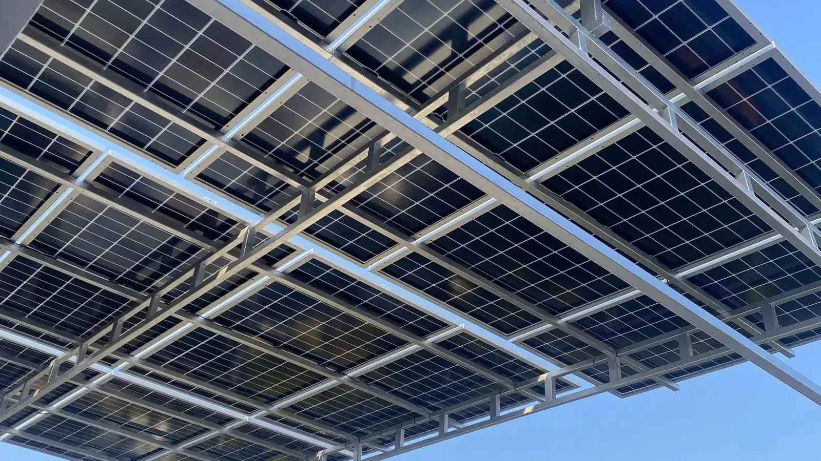 Solar panels on a residential roof with battery-supported hybrid equipment