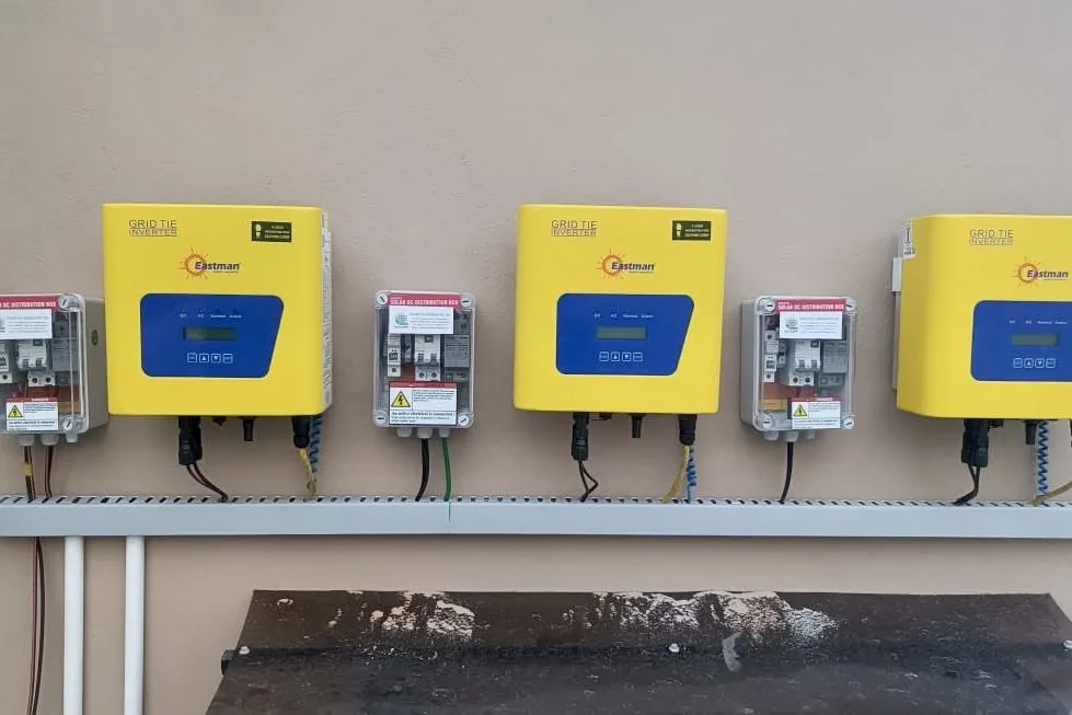 Grid-tie inverters and DC distribution boxes at a solar installation