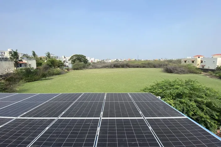 Solar array beside open farmland