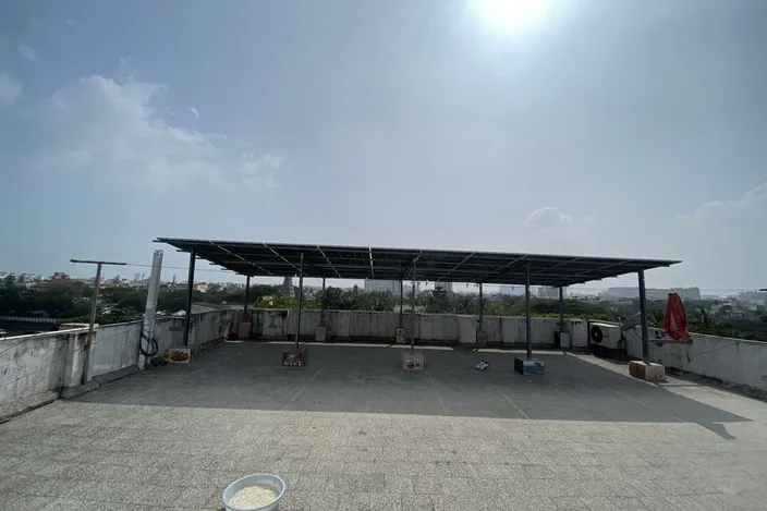 Solar canopy above a Chennai rooftop terrace