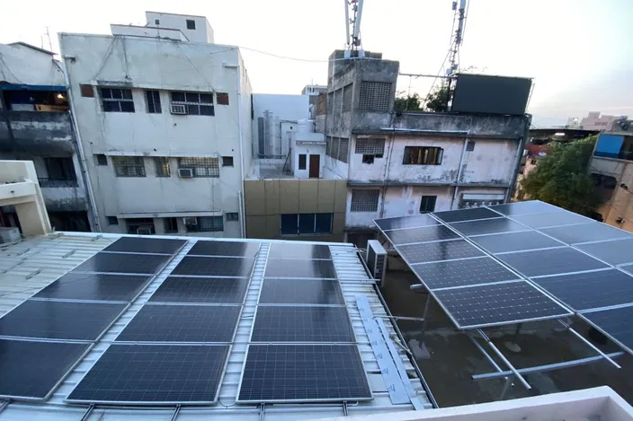 Rooftop solar arrays at dusk in Chennai